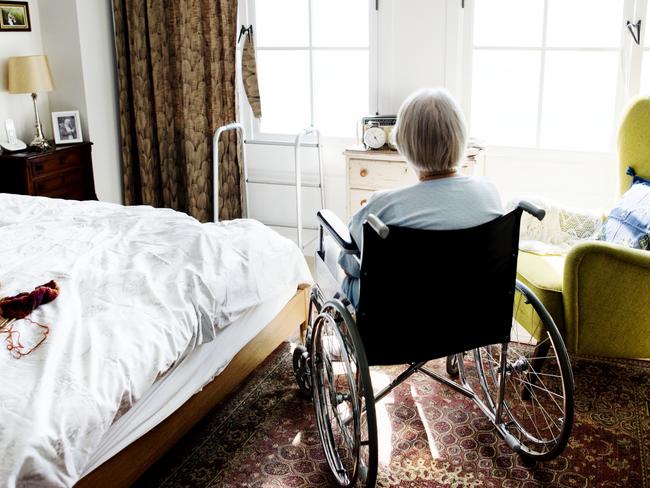 BAD AGED CARE:   Senior woman sitting on the wheelchair alone