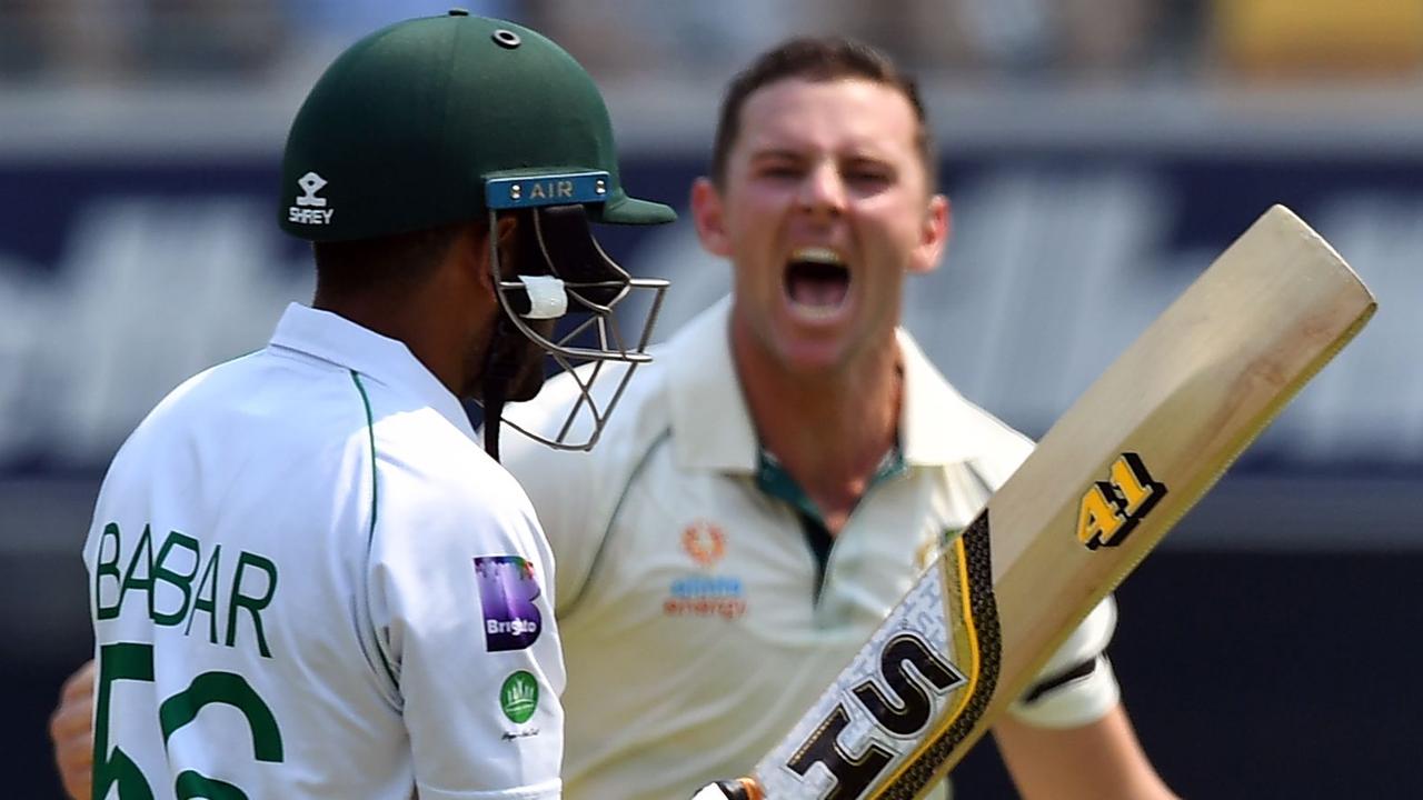 Australia's paceman Josh Hazlewood celebrates his wicket of Pakistan's Babar Azam.