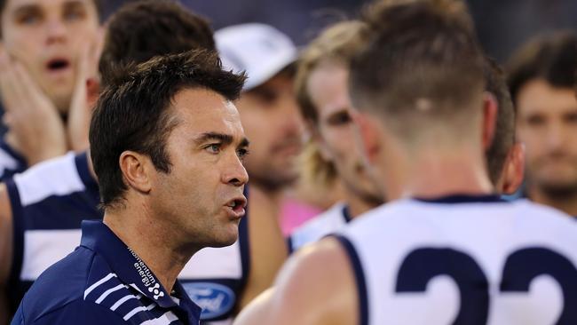 Geelong coach Chris Scott talks to his players during the loss to Collingwood. Pic: Michael Klein