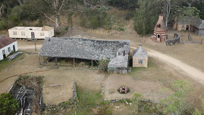 Old Sydney Town Blacksmith's forge with potters hut and bottle forge at right. Picture: @switchy3 / Mitchell Hubbard.