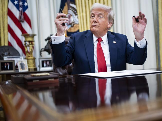 Washington, DC - March 31 : President Donald J Trump, with singer Kid Rock by his side, speaks to reporters and signs an executive order about enforcement in the concert and entertainment industry, in the Oval Office at the White House on Monday, March 31, 2025 in Washington, DC. (Photo by Jabin Botsford/The Washington Post via Getty Images)