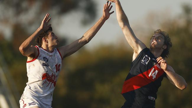 Brandon Ryan (left) competes in the ruck. Picture: Daniel Pockett/AFL Photos/via Getty Images