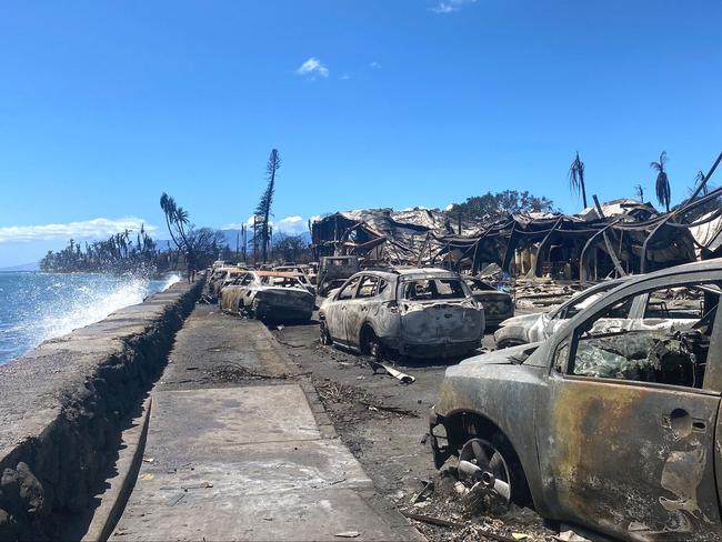 Burned cars and destroyed buildings in the aftermath of a wildfire in Lahaina, western Maui. Picture: AFP