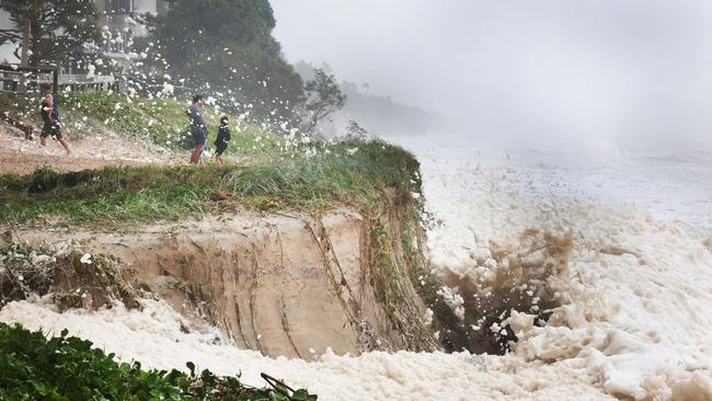 Gold Coast battered by Cyclone Alfred, as it made land. Erosion and foam make for a spectacle at Main Beach. Picture Glenn Hampson