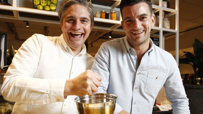 Warringah Mall has opened a new food court and marketplace outside Woolworths. Pictured is Will and Steve from TV show MKR doing a cooking demo.