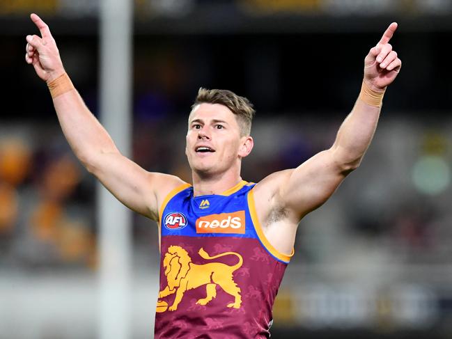 Dayne Zorko of the Lions celebrates kicking a goal during the Round 21 AFL match between the Brisbane Lions and the Gold Coast Suns at the Gabba in Brisbane, Saturday, August 10, 2019.  (AAP Image/Darren England) NO ARCHIVING, EDITORIAL USE ONLY