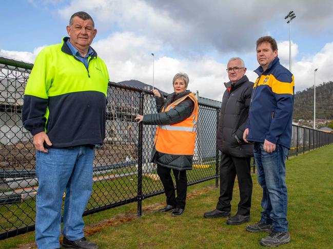 Adrian Granger from Kelly Civil Contracting with Mayor of Glenorchy Sue Hickey, Federal member for Clark Andrew Wilkie and Metro club president, Simon Land, surveying the works at Metro soccer club in Chigwell where building supplies have been stolen.Picture: Linda Higginson