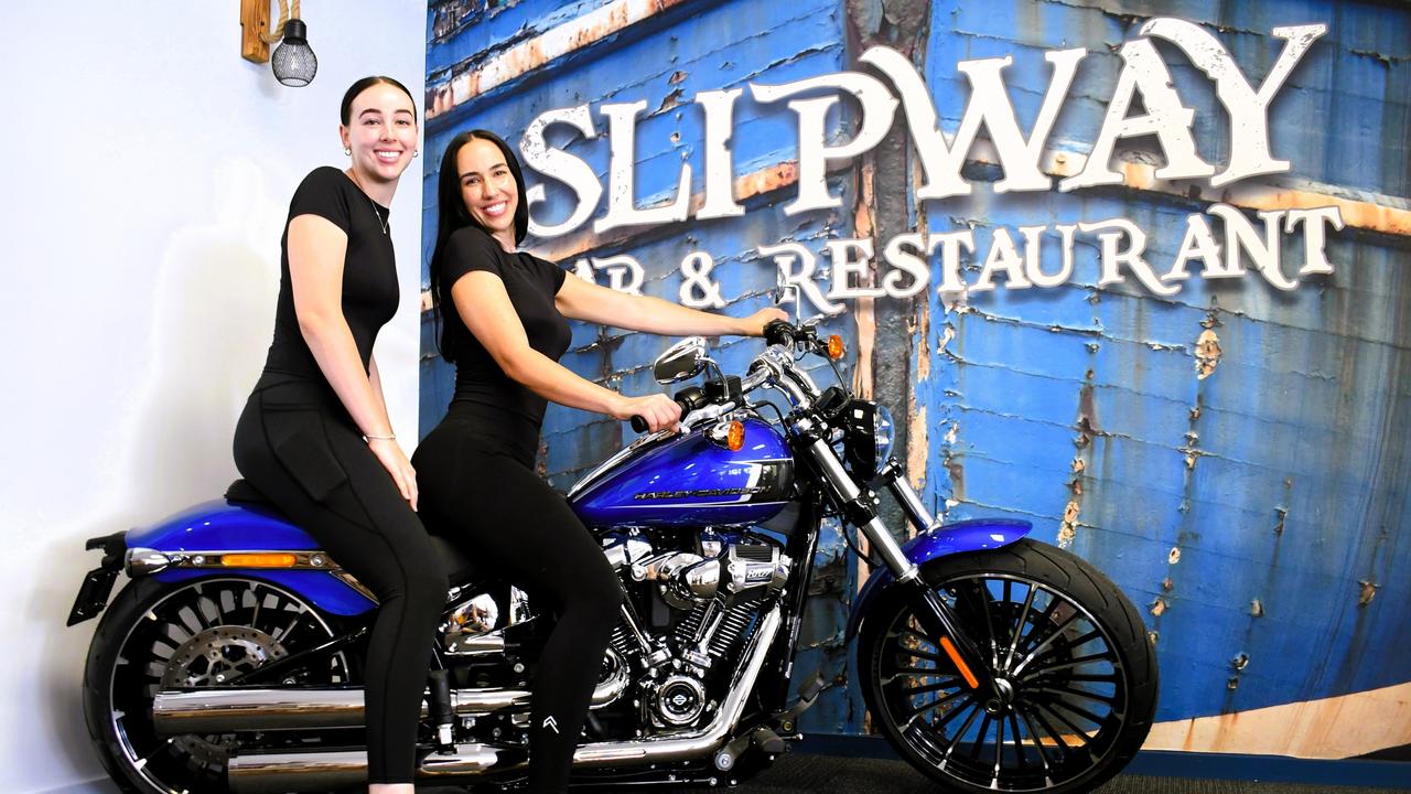 Ella and April McLennan of Lucinda Cove Resort sit atop an impressive $40,000 Harley-Davidson in the popular Slipway Bar and Restaurant fronting Enterprise Channel and Hinchinbrook Island. The motorbike is up for grabs to local and regional punters who spend at the restaurant or bar or stay at the motel, with the winning entry drawn on December 20 this year. Picture: Cameron Bates