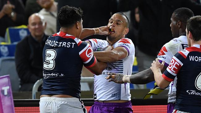 A frustrated Chambers had two Roosters score on his side of the field when the frustration boiled over. (AAP Image/Joel Carrett)