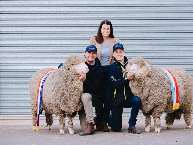 Winning pair: Rod and Sue Miller with son Harry, 16, from Glenpaen Merino stud at Brimpaen with their supreme Merino ewe andgrand champion ram at the Australian Sheep and Wool Show. Picture: Chloe Smith .