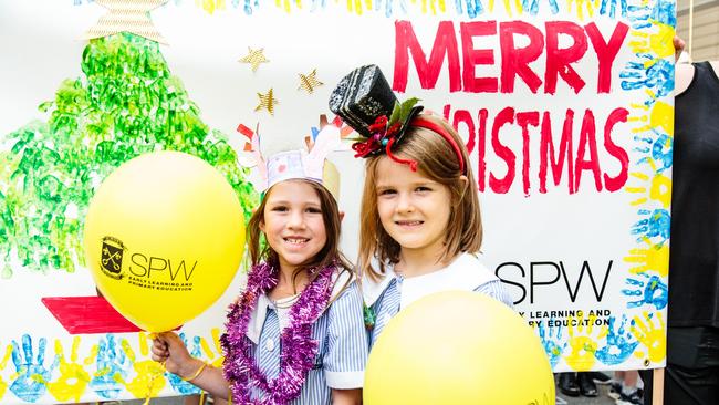 Lucy Pisanelli and Baylee Hanna at the Glenelg Christmas pageant in 2017. Picture: Helen Page