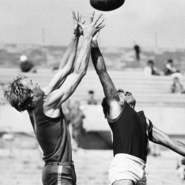 Footballer Graham Cornes (l) and Des James. Football - SA vs Tasmania State-of-Origin imatch at Football Park 11 Oct 1980.