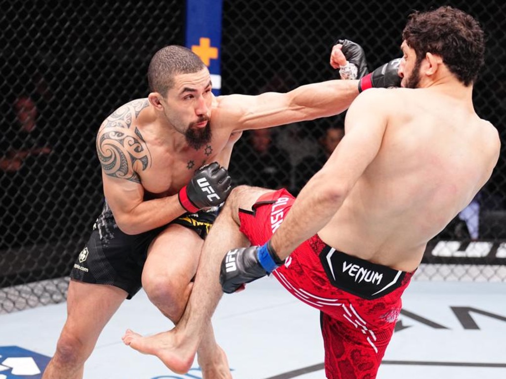 RIYADH, SAUDI ARABIA - JUNE 22: (L-R) Robert Whittaker of New Zealand punches Ikram Aliskerov of Russia in a middleweight fight during the UFC Fight Night event at Kingdom Arena on June 22, 2024 in Riyadh, Saudi Arabia. (Photo by Chris Unger/Zuffa LLC via Getty Images)