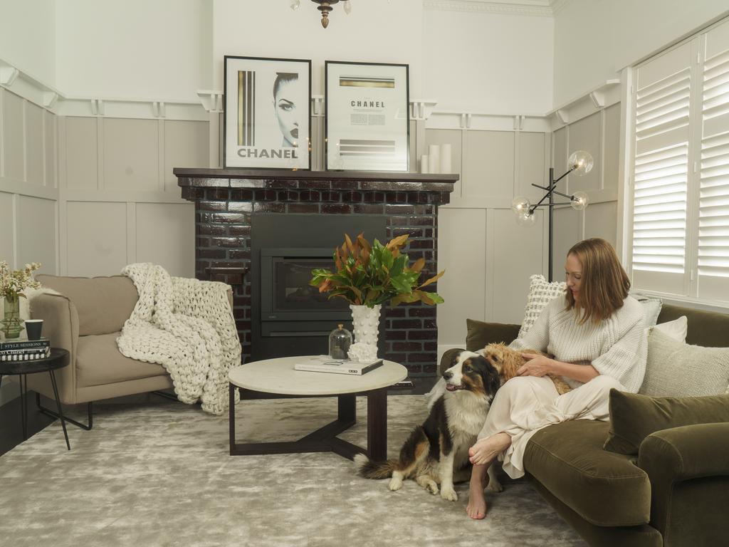 Carlea Elmes at her home in Dunbar Terrace with her dogs, Alfie (Cavoodle) and Barkley (Border Collie) Picture: Nick Clayton.