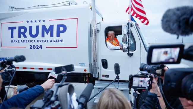 Donald Trump holds a press conference from inside trash hauler in Green Bay, Wisconsin on October 23. Picture: Chip Somodevilla/Getty Images/AFP