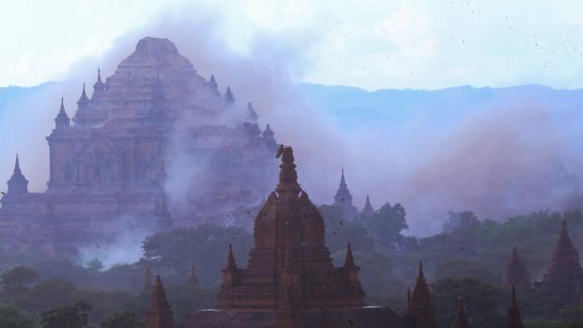 The ancient Dhammayangyi temple is seen shrouded in dust as a 6.8-magnitude earthquake hit Bagan in central Myanmar. Picture: AFP/Soe Moe Aung