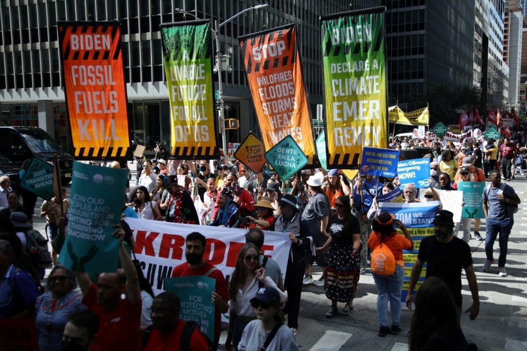 Climate protesters throng New York, demand end to fossil fuels news