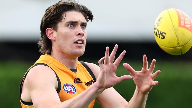 MELBOURNE, AUSTRALIA - APRIL 19: Will Day of the Hawks marks during a Hawthorn Hawks AFL training session at Waverley Park on April 19, 2024 in Melbourne, Australia. (Photo by Quinn Rooney/Getty Images)