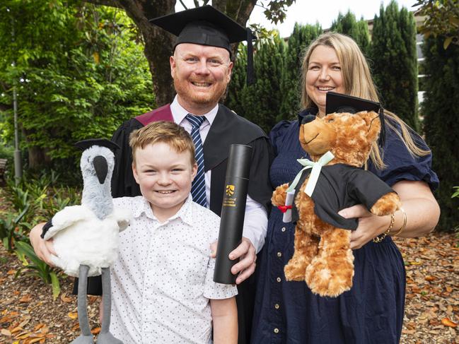 Bachelor of Engineering (Honours) graduate Adam Smith with son Aiden and wife Felicity Smith at a UniSQ graduation ceremony at The Empire, Wednesday, October 30, 2024. Picture: Kevin Farmer