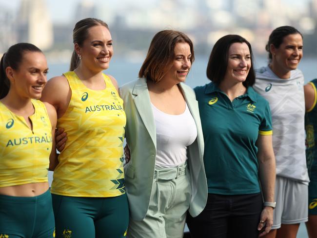 Athletes Charlotte Caslick; Eileen Cikamatana; Izzi Batt-Doyle; Kelsey-Lee Barber and Lydia Williams pose with Australian Olympic Team Chef de Mission Anna Meares and Minister for Sport Anika Wells. Picture: Getty