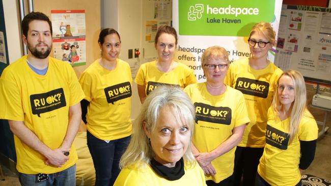 headspace Lake Haven and Gosford manager Helen Isenhour with staff (L-R) Silas Pollard , Gina Wager , Nicole Greenwood , Cathy Crosswell , Joy Greatorex , Kirra Mullarkey ahead of RU OK Day. Picture by Mark Scott