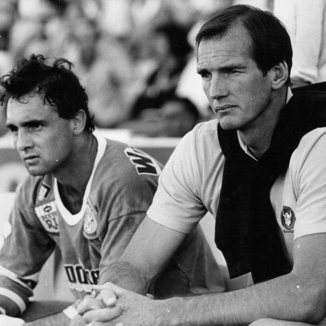 **This picture has a scanned reverse - see associated content at the bottom of the details window**layer Ivan Henjak (L) and Raiders Coach Wayne Bennett watching the action from the sideline during the Parramatta Eels v Canberra Raiders RL game in Parramatta, western Sydney 26/04/1987.