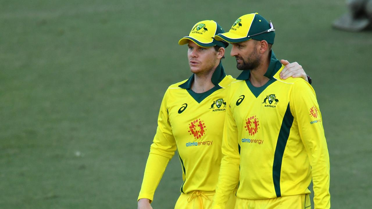 Nathan Lyon (right) is set to be overlooked for Australia’s second World Cup match. Photo: Darren England/AAP Image.