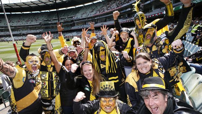 Richmond fans show off their colours at the MCG.