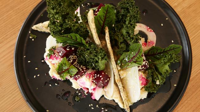 Cauliflower hummus chia crackers with fried kale chips, beetroot cubes, fennel slices and feta.