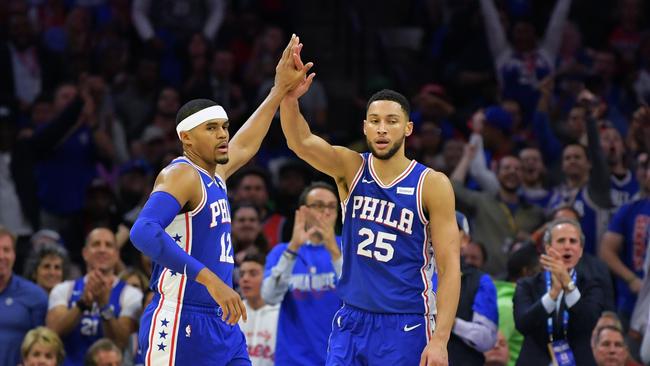 PHILADELPHIA, PA - OCTOBER 23: Tobias Harris #12 and Ben Simmons #25 of the Philadelphia 76ers celebrate during the game against the Boston Celtics at Wells Fargo Center on October 23, 2019 in Philadelphia, Pennsylvania. NOTE TO USER: User expressly acknowledges and agrees that, by downloading and or using this photograph, User is consenting to the terms and conditions of the Getty Images License Agreement.   Drew Hallowell/Getty Images/AFP == FOR NEWSPAPERS, INTERNET, TELCOS & TELEVISION USE ONLY ==