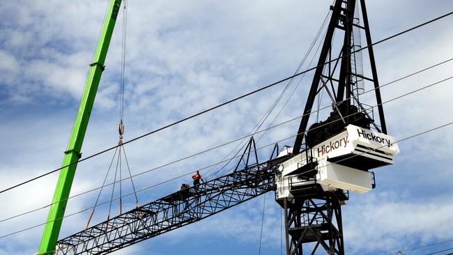 A Large crane is erected at a construction site on Plenty Road in Preston.