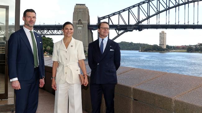 Swedish Minister for International Development Co-operation and Foreign Trade Johan Forssell, left, Crown Princess Victoria and her husband Prince Daniel in Sydney on Wednesday. Picture: Getty Images