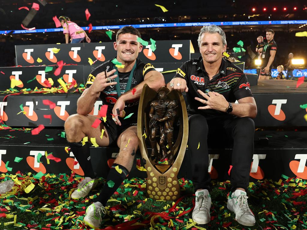 Nathan and Ivan Cleary of the Panthers pose with the Provan-Summons Trophy after their 2023 grand final victory. Picture: Getty Images