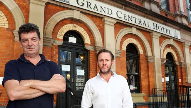 Pub owner Jaz Mooney, left, and Paul Fraser from CBRE at the Grand Central Hotel in Brisbane.