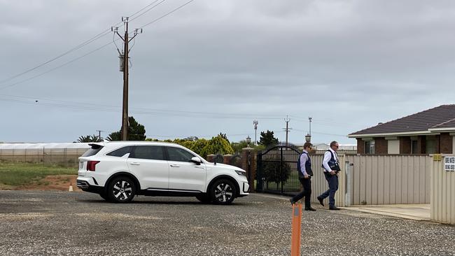 Detectives interviewing neighbours after a series of shots were fired by suspects at Virginia on early Friday morning. Picture: Roy Vandervegt