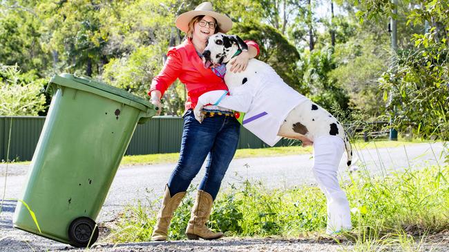 Nicole Brandon with Baxter the Great Dane dressed as Buzz Lightyear. Picture: Renae Droop