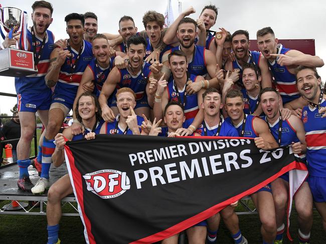 Keilor’s players strike a premiership pose at Windy Hill. Picture: Andy Brownbill