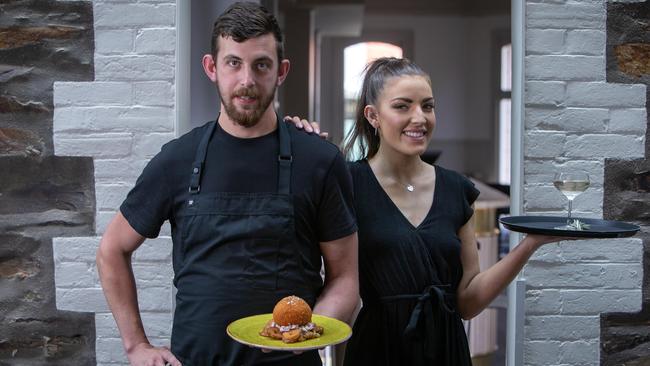 Brompton Hotel, Chef Andrew Wandless holds his signature Chicken Kyiv and Duty Manager Emmy Thomson with the Brompton special Martini. Picture: Emma Brasier