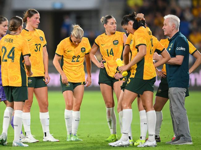 GOLD COAST, AUSTRALIA - DECEMBER 01: Tom Sermanni, Interim Head Coach of Australia talks to his players during the International Friendly match between the Matildas and Brazil at Cbus Super Stadium on December 01, 2024 in Gold Coast, Australia. (Photo by Matt Roberts/Getty Images)