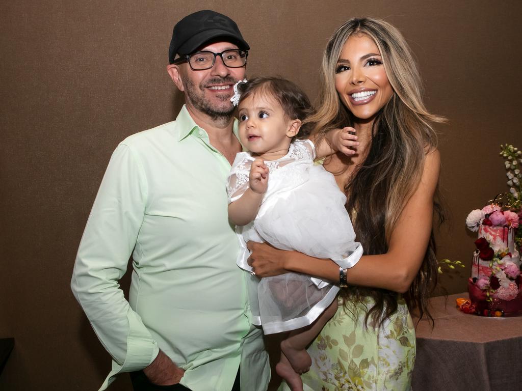 Alex Waislitz pictured in 2020 with his partner Rebekah Behbahani and their daughter Storm.