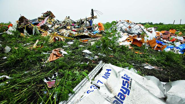 Wreckage from Malaysia Airlines Flight MH17, which was shot down over a rebel-held area of eastern Ukraine in July 2014. Newly released phone call intercepts raise questions about the possible involvement of Russian government officials in the downing of the jet. Picture: News Corp