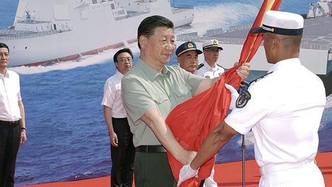 Chinese President Xi Jinping at the commissioning ceremony for three naval vessels last Friday. Picture: CGNT