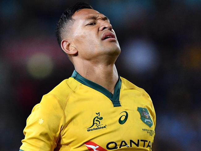 Australia's Israel Folau reacts during Rugby Championship Bledisloe Cup match against New Zealand in Sydney on August 18, 2018. (Photo by Saeed KHAN / AFP) / -- IMAGE RESTRICTED TO EDITORIAL USE - STRICTLY NO COMMERCIAL USE --