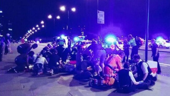 Emergency services attend to people on London Bridge.