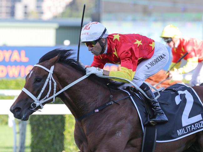 SYDNEY, AUSTRALIA - APRIL 15: Joao Moreira riding Militarize   wins Race 7 Moet & Chandon Champagne Stakes during "Schweppes All Aged Stakes Day" - Sydney Racing at Royal Randwick Racecourse on April 15, 2023 in Sydney, Australia. (Photo by Jeremy Ng/Getty Images)