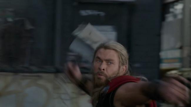 Thor (Chris Hemsworth) throws his Mjolinir in a scene from the Thor: Ragnarok trailer filmed in the Brisbane CBD. Picture: Marvel.