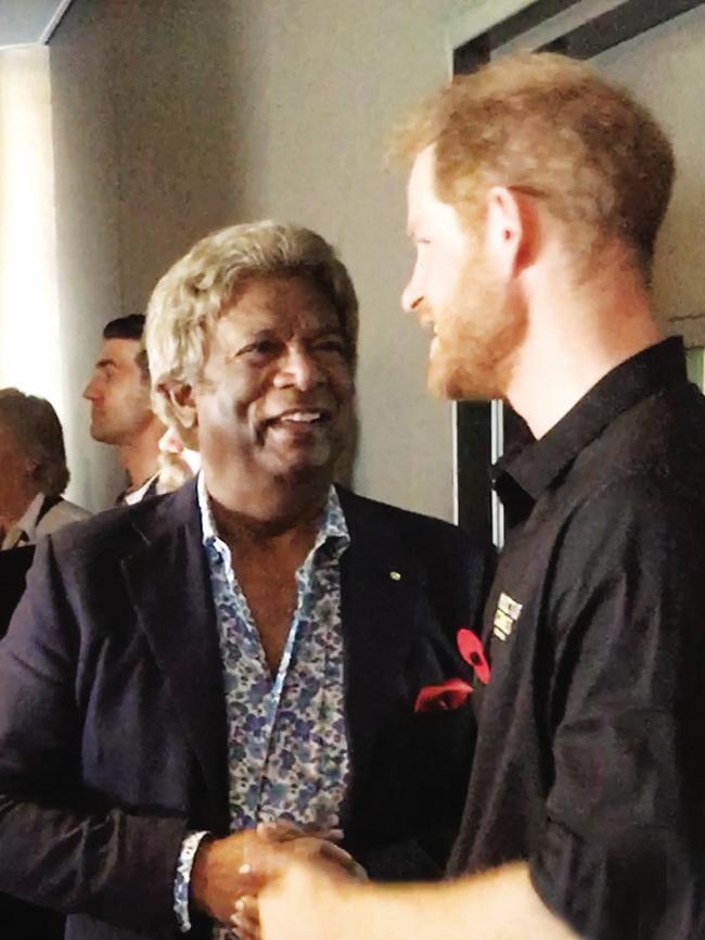 Kamahl pictured with Prince Harry. Picture: Supplied