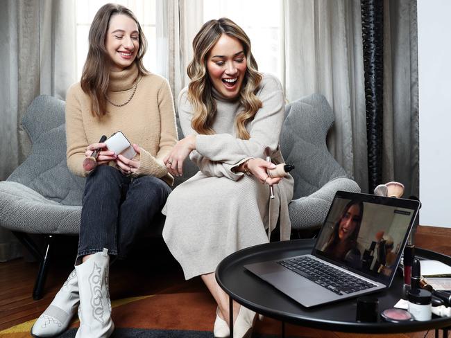 Adore Beauty podcast editor Joanna Fleming (on screen), teaching Amy Kaleski and Lou Hay about make-up during a virtual consultation at QT Sydney. Picture: Tim Hunter