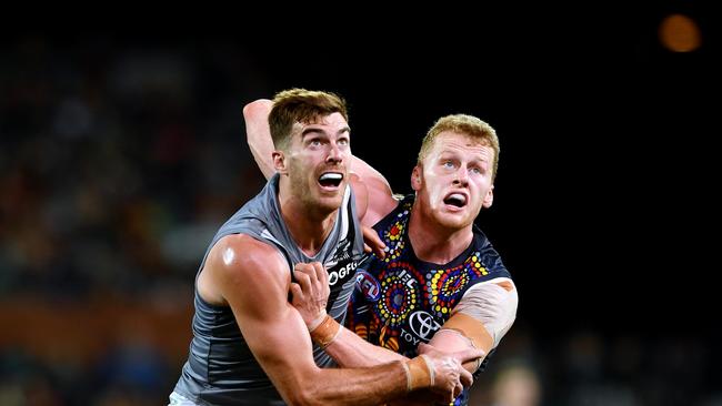 ADELAIDE, AUSTRALIA – JULY 06: Scott Lycett of Port Adelaide rucks against Reilly O'Brien of the Adelaide Crows during the round 16 AFL match between the Adelaide Crows and the Port Adelaide Power at Adelaide Oval on July 06, 2019 in Adelaide, Australia. (Photo by Mark Brake/Getty Images)