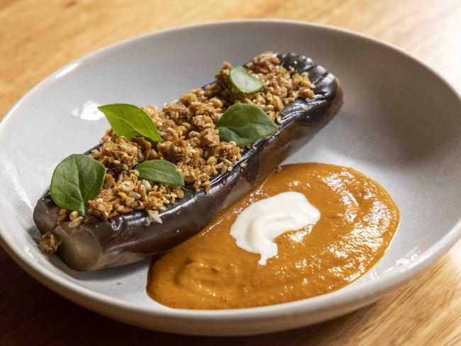 The eggplant with granola works on paper, not in practice. Picture: Wayne Taylor